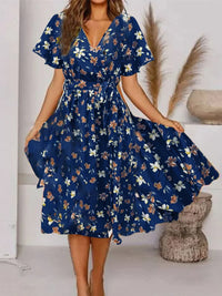 Evy | Elegant Midi Kjole med Romantisk Blomsterprint