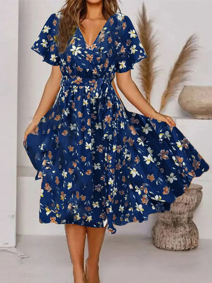 Evy | Elegant Midi Kjole med Romantisk Blomsterprint