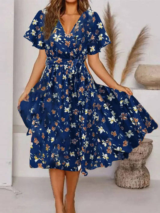 Evy | Elegant Midi Kjole med Romantisk Blomsterprint